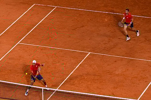 Austin Krajicek and Rajeev Ram of the USA compete in men's doubles quarter-final